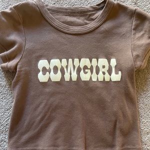 Brandy Melville brown cropped top. Cowgirl written across the chest.